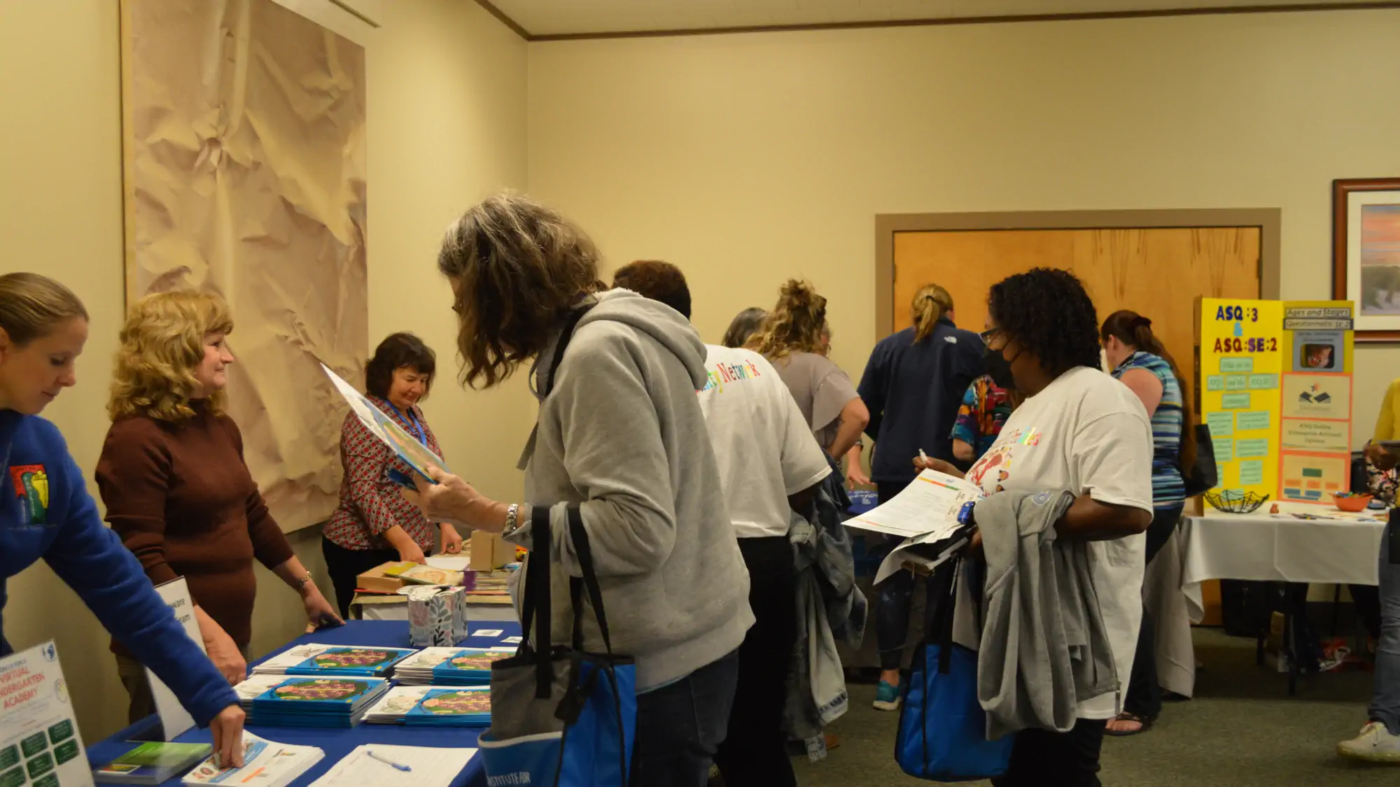 Participants check in for conference