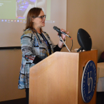 Rena Hallem speaks to the conference attendees.