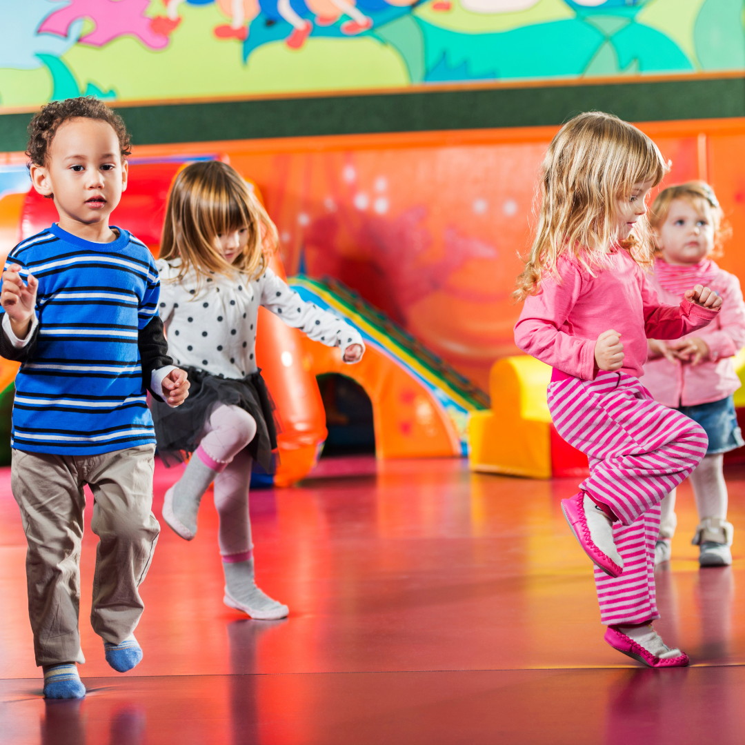 Teacher surrounded by a group of engaged children, it highlights the importance of active and appropriate supervision to ensure child safety and attendance tracking in child care settings.