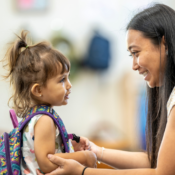 A mother and daughter preparing for school
