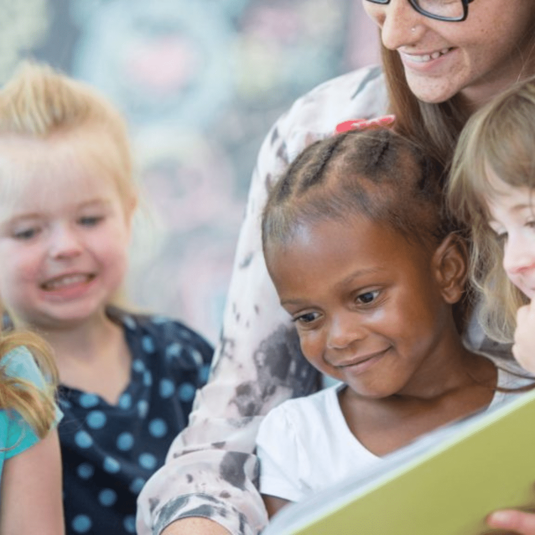 Children being read a book