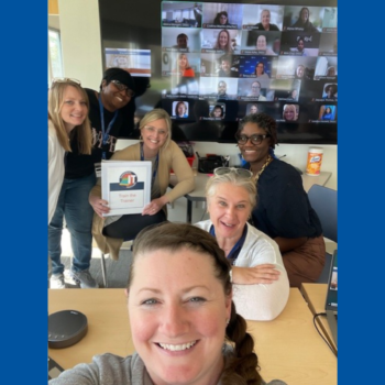 Woman holding an award